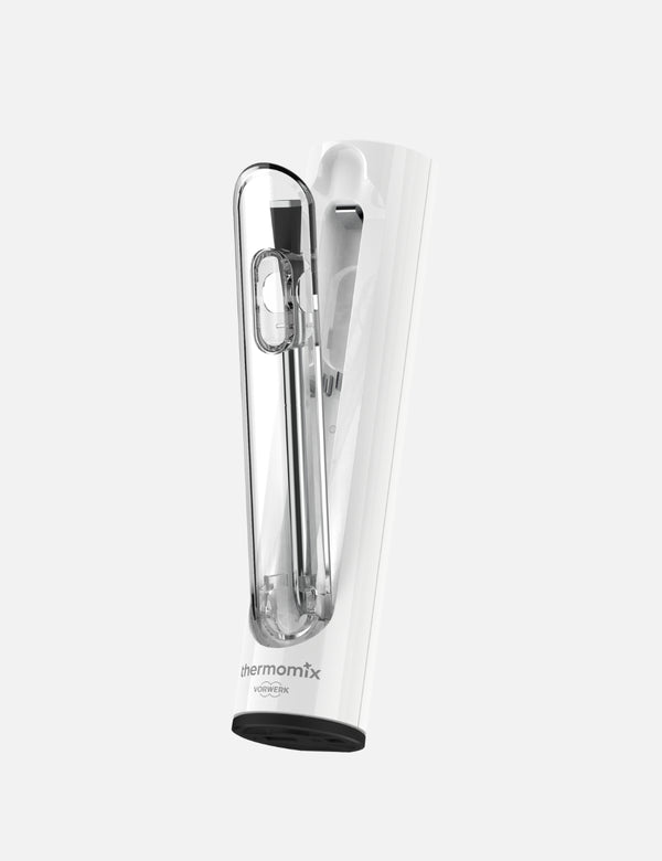 A smart thermometer with a digital display and sensors, primarily white in color, branded by Thermomix.