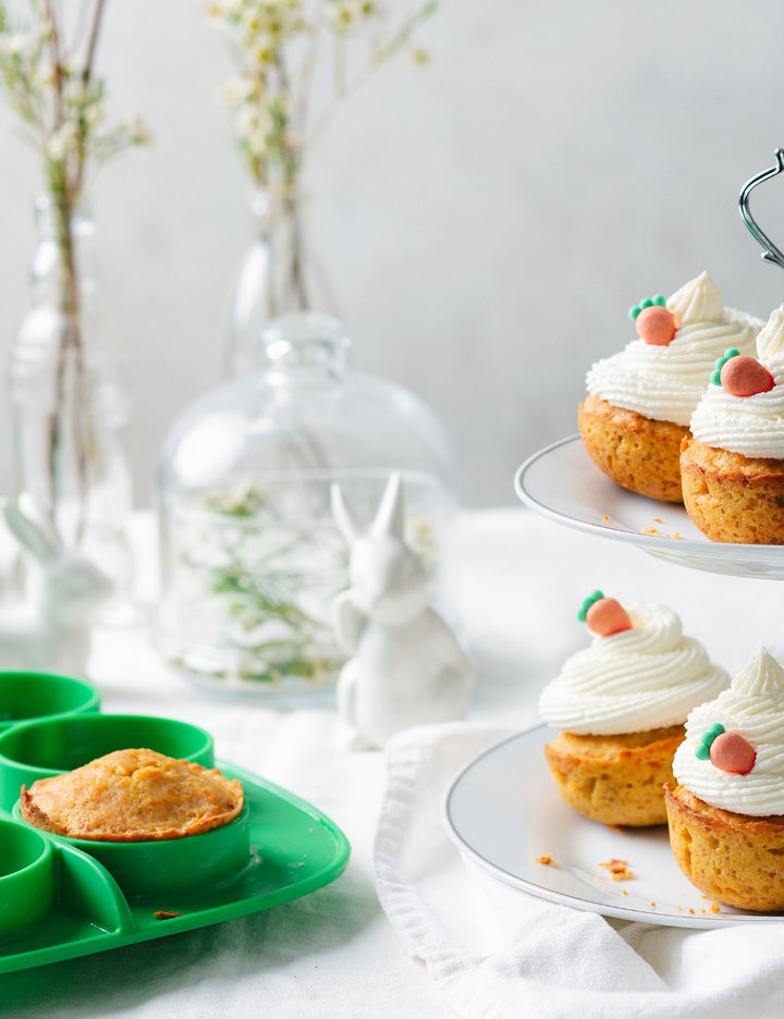 Green Thermomix The Nester silicone insert inside the Varoma tray for cooking and food preparation.