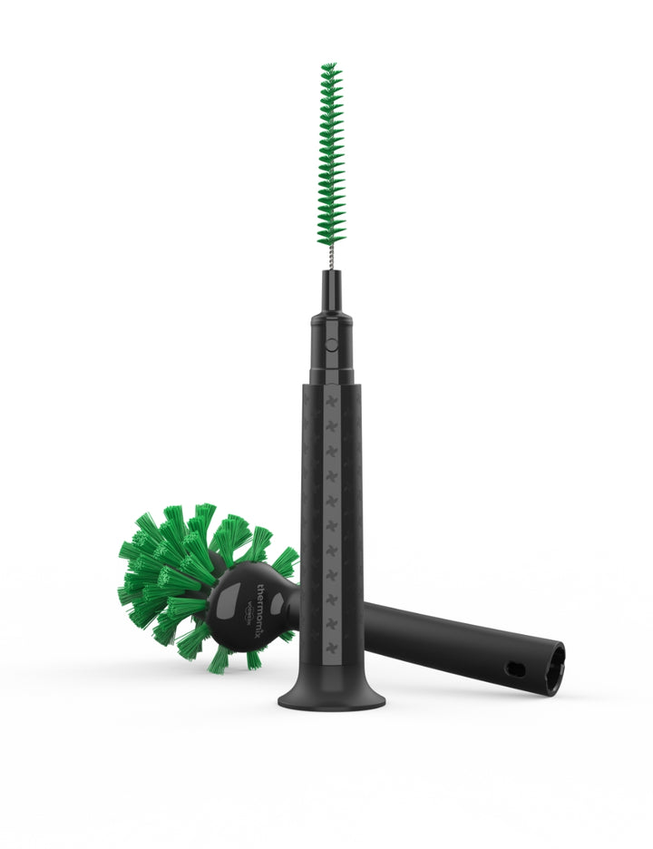 Thermomix® 2-in-1 Mixing Bowl Brush cleaning the inside of a Thermomix® mixing bowl with dual brush design for bowls and blades.